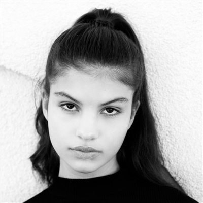 MARIA L.